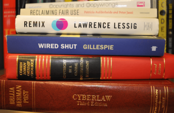 Crop of Copyright Books photo by Casey Fiesler (CC BY 2.0) showing books on copyright for digital GLAMS.