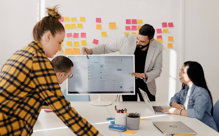 Demo of working software at a Sprint Review. Photo by You X Ventures on Unsplash.